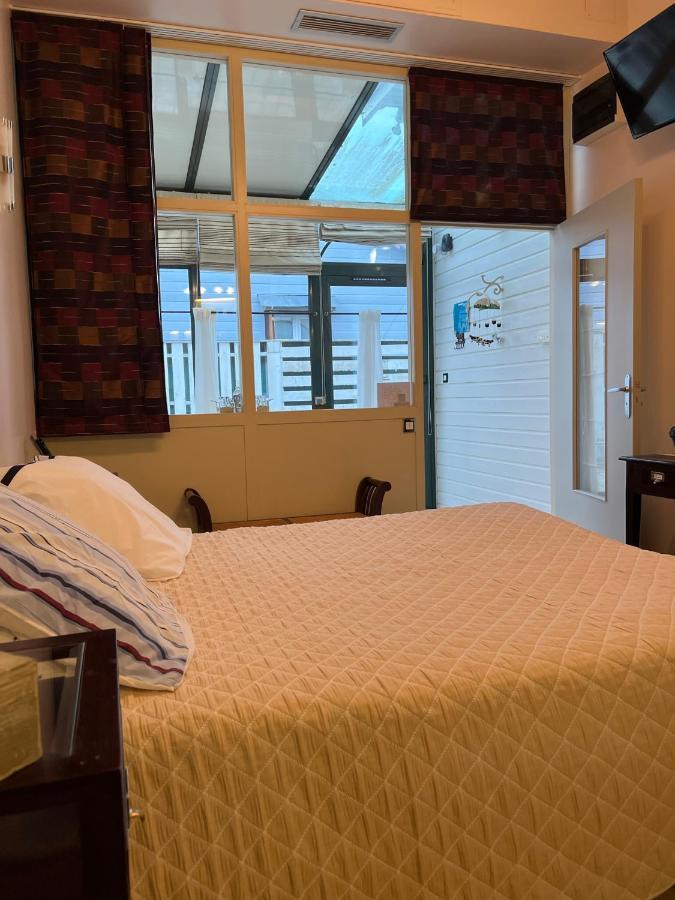 Hotel Le Manoir Aux Vaches Ивто Екстериор снимка